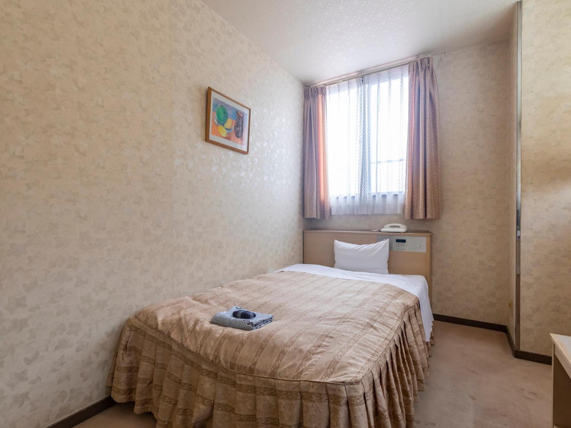 Hotel Tabist Annex Matsumi Beppu Zimmer foto