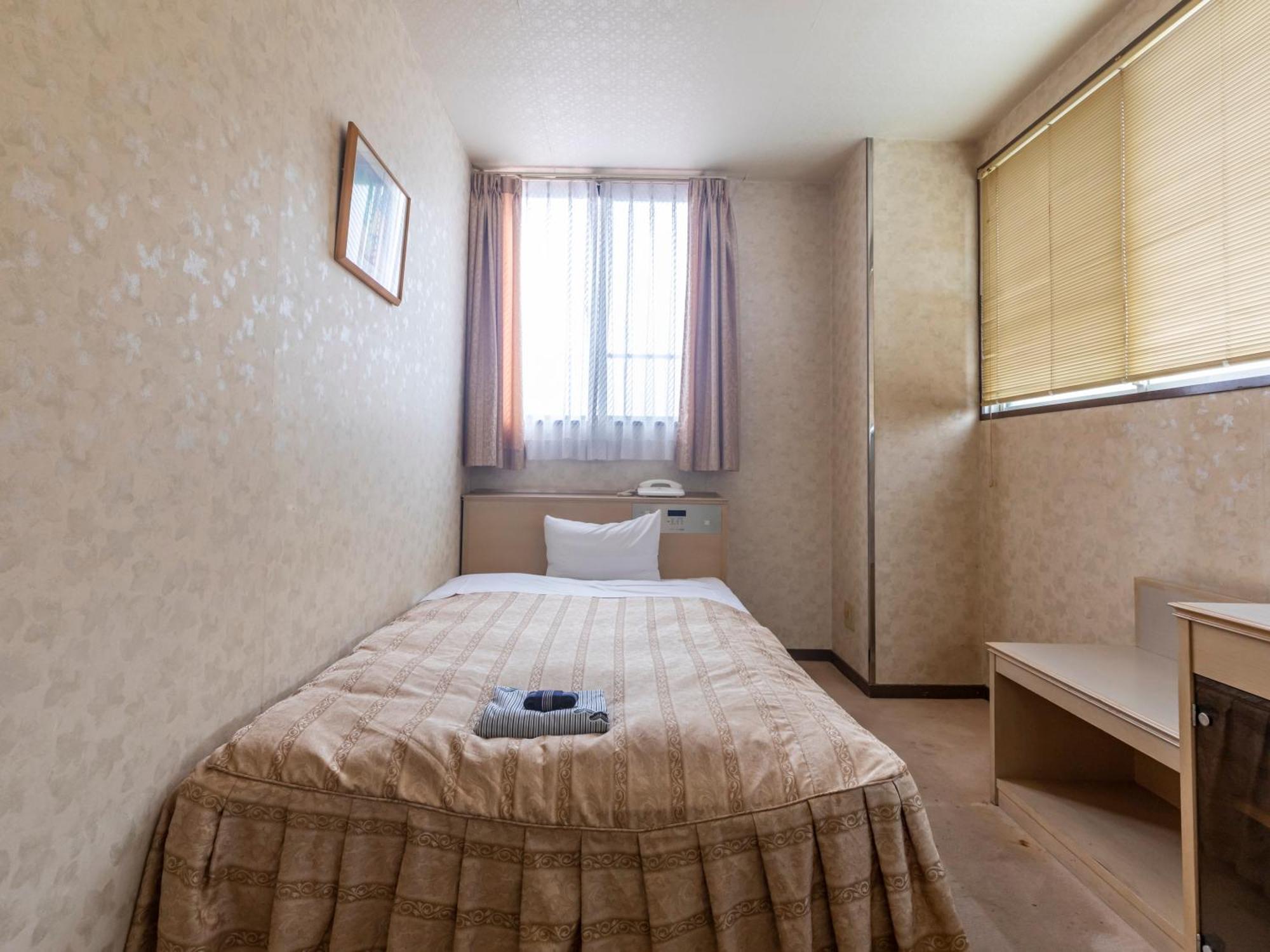 Hotel Tabist Annex Matsumi Beppu Zimmer foto