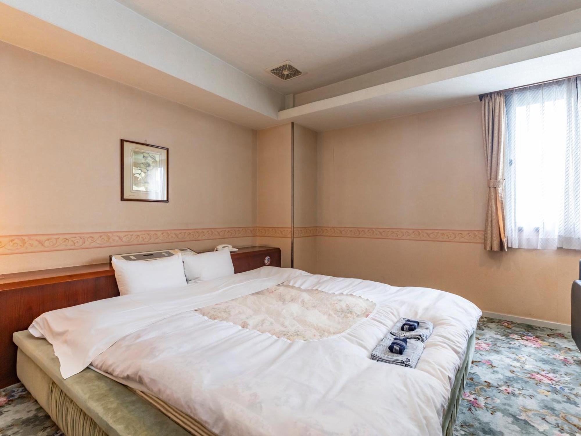 Hotel Tabist Annex Matsumi Beppu Zimmer foto